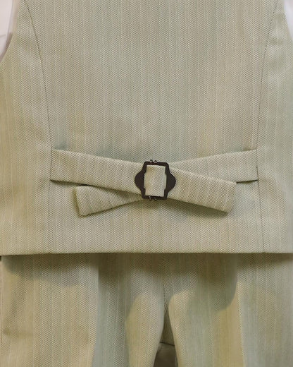 Close-up of the adjustable back strap and buckle on the boys' sage green formal vest.